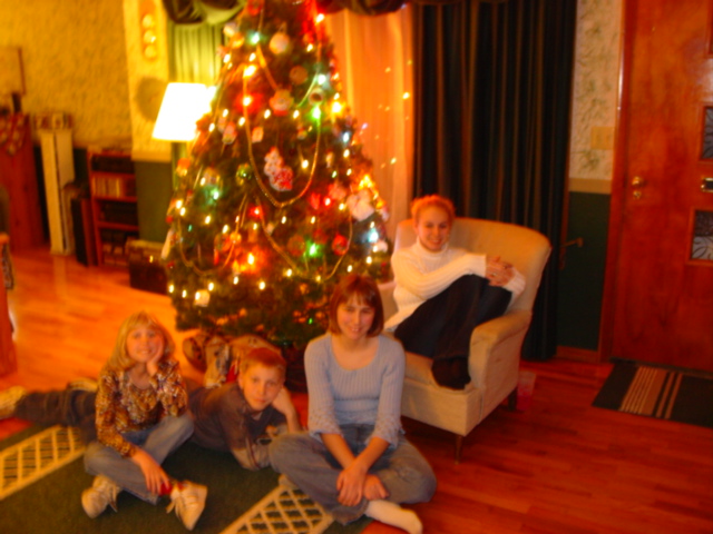 children by the christmas tree